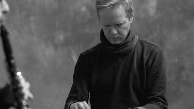 Ivar Grydeland playing a prepared guitar and pedal steel guitar