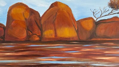 A painting of orange rocks