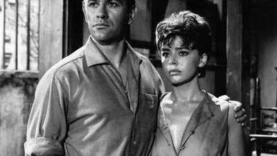 The Day the Earth Caught Fire 7:00 PM Fri, Oct 30, 2026 Black and white image of woman and man standing together looking forlorn past the camera