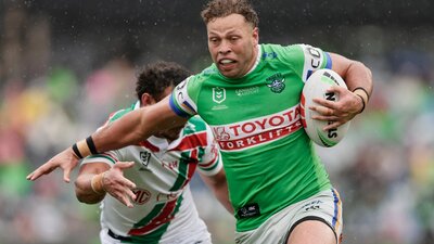 Canberra Raiders player Sebastian Kris running the ball.