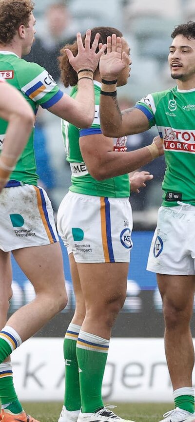Canberra Raiders player Xavier Savage celebrating a try.