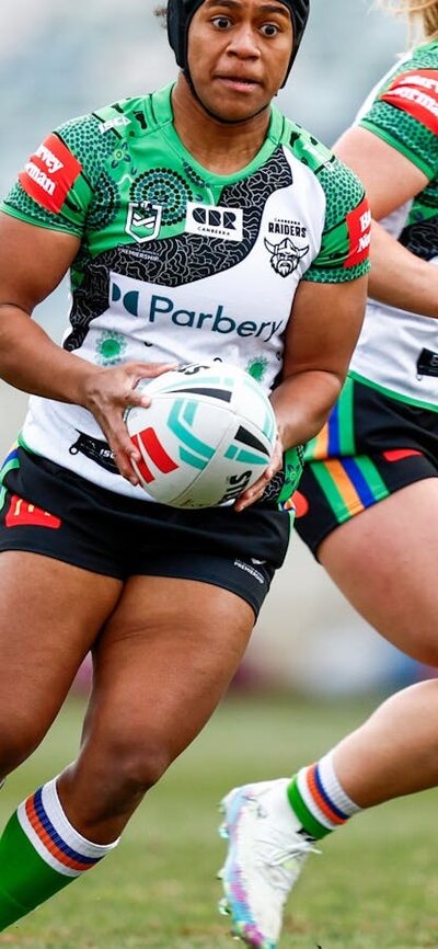 Canberra Raiders NRLW player Sereana Naitokatoka running the ball.