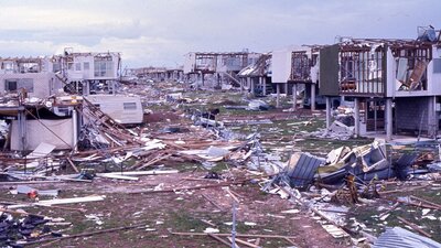Destroyed land and housing after a natural disaster