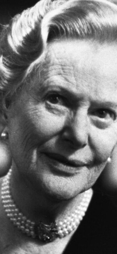 Australian Biography Series 1: Nancy Bird Walton (1992) Older woman wearing pearls around neck looking past camera, black and white photo
