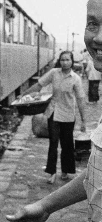 Broken Journey, Mending Dreams (1992) One older man with big smile turning back to look at camera, younger male on left looking at camera
