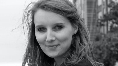 Dr Elisa DeCourcy Headshot of Elisa DeCourcy