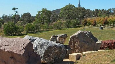A panoramic image displays the variety of large rocks in the National Rock Garden