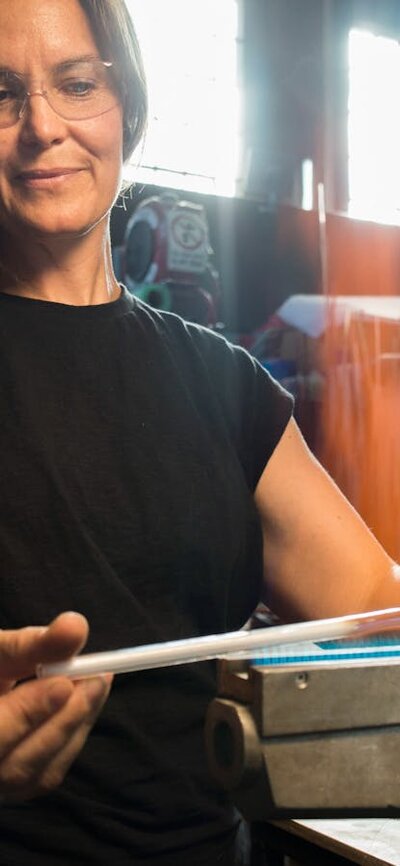 Neon Glass Artist bending glass