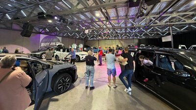 Electric cars in a warehouse