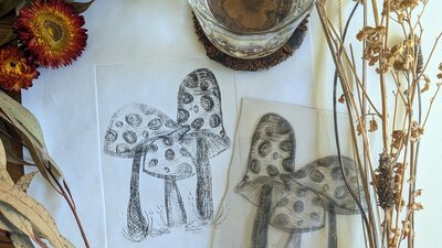 Art workshop samples. Print of mushrooms with the etching plate and gin and tonic