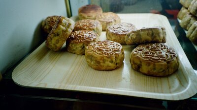 A photograph of mooncakes sitting on a tray