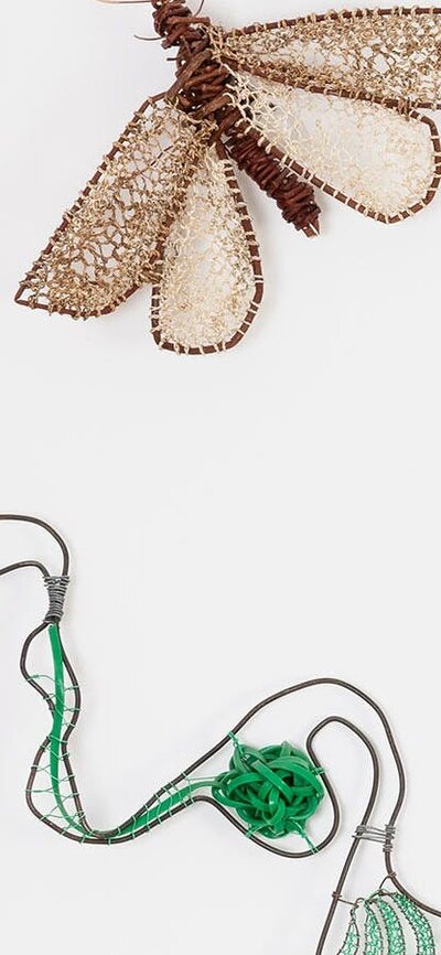 Woven insects and abstract shapes made from natural materials