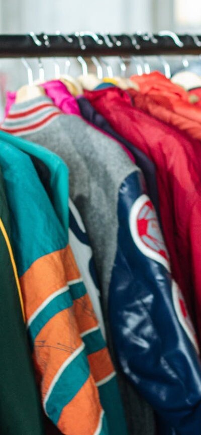 colourful rack of vintage jackets