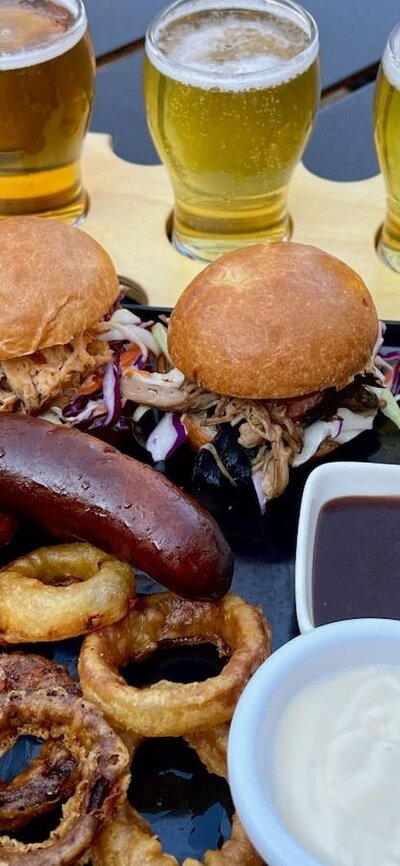 Smoked meats, burger sliders, beer paddles
