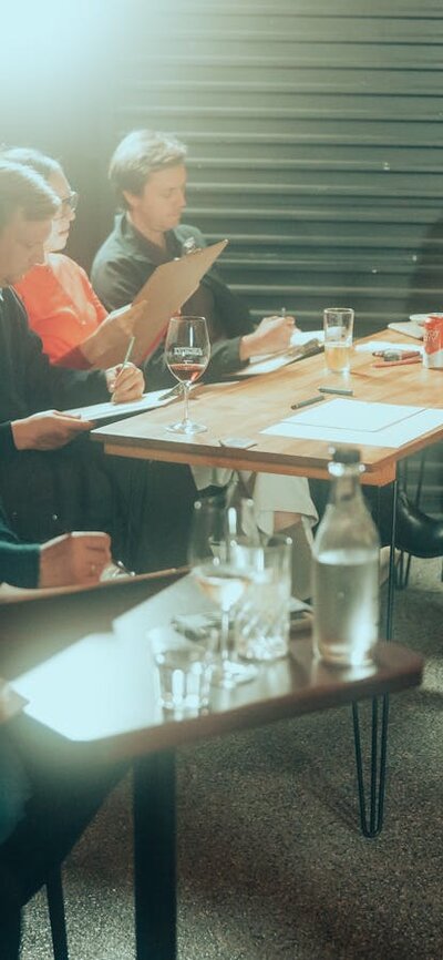 People sitting and drawing