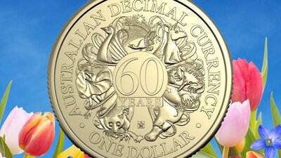 Floriade About Town Mint coin surrounded by flowers