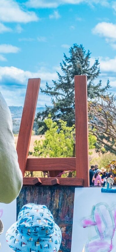 Father and child partake in craft activities at Lanyon Homestead's Kids Day Out Floriade event