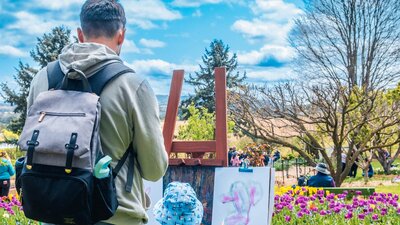 Father and child partake in craft activities at Lanyon Homestead's Kids Day Out Floriade event