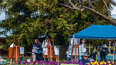 Visitors to Lanyon Homestead admire the gardens and partake in craft activities
