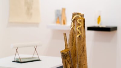 Several sculptures in a gallery