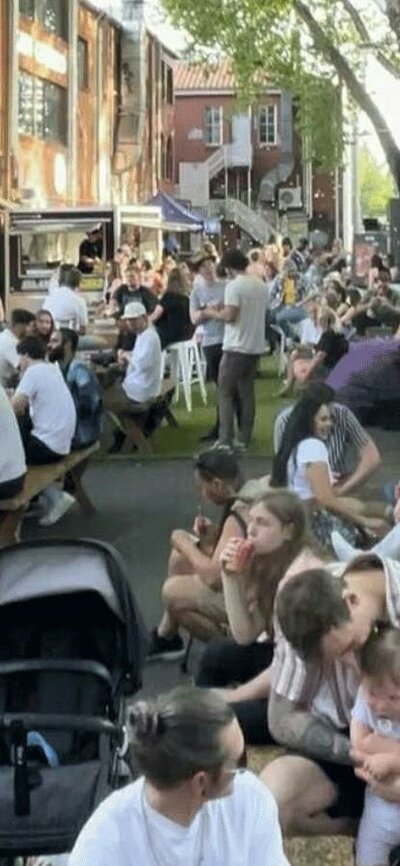 laneway full of people for festival