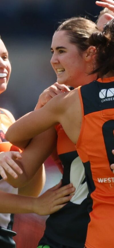 GIANTS AFLW team celebrate a goal