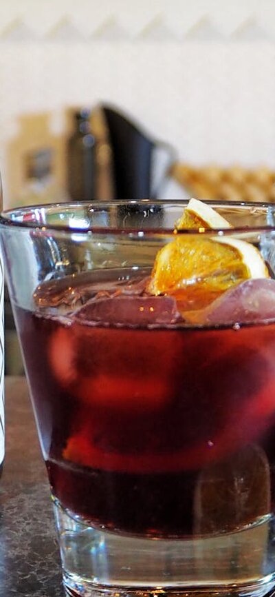 Big River Syrah Gin and negroni Syrah Gin bottle and negroni cocktail