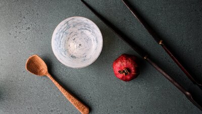 hand carved wooden spoon, and blown bowl