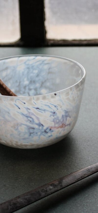 hand carved wooden spoon, and blown bowl