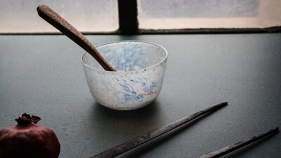 hand carved wooden spoon, and blown bowl