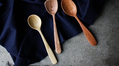 hand carved wooden spoon, and blown bowl