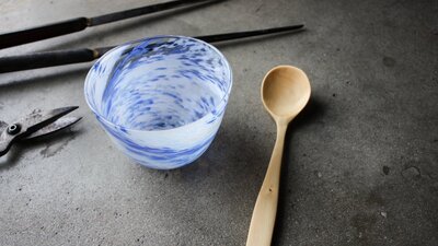 hand carved wooden spoon, and blown bowl