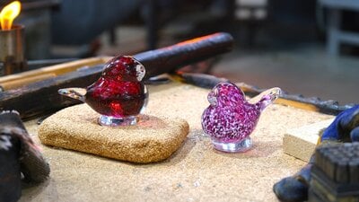 Glass birds from Make Your Own glassblowing class at Canberra Glassworks Two glass birds in the Hotshop
