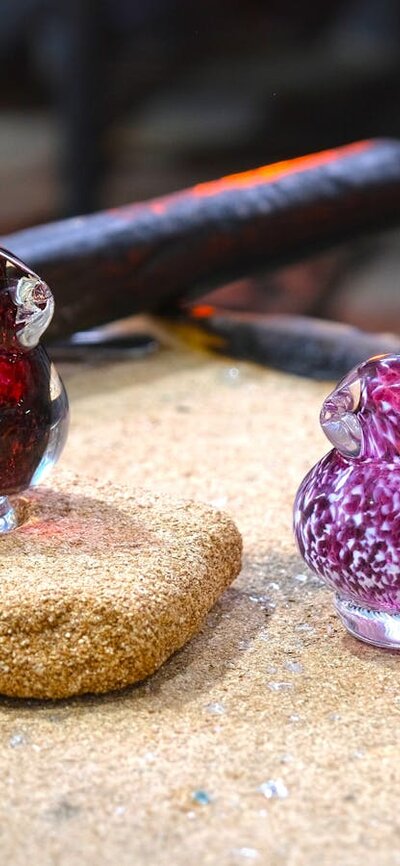 Glass birds from Make Your Own glassblowing class at Canberra Glassworks Two glass birds in the Hotshop