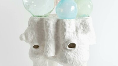 Lynda Draper artwork, made of glazed ceramic and studio blown glass, on white background