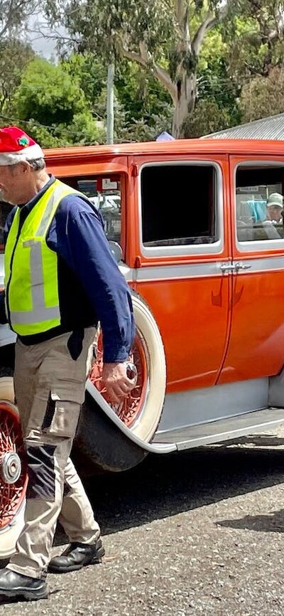 Santa and vintage classic car