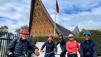People on bikes outside the Papua New Guinea High Commission.