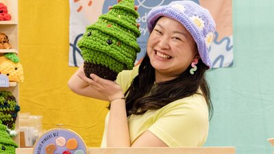 Productive by You Productive by You holding a crochet Christmas tree