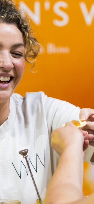 Women's Work serving a customer