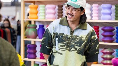 Isekai Studio smiling at a customer