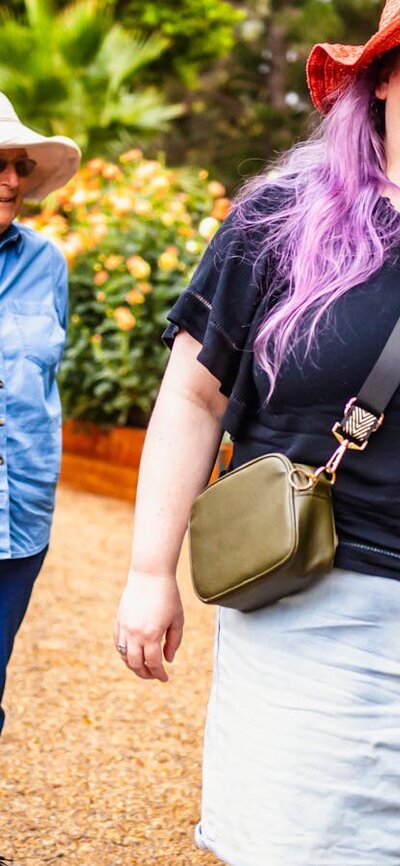Two women enjoying the gardens at Harvest Day Out