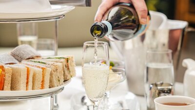 High Tea at Pavilion Champagne pour into glass