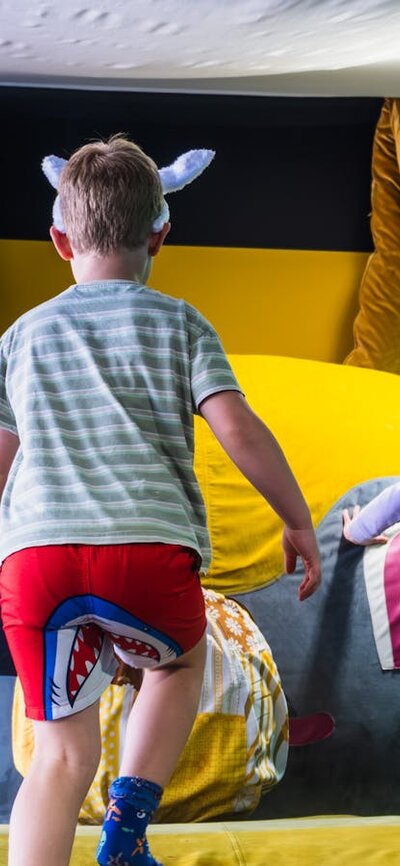 3 children playing on Bunny Dearest