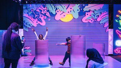 Children enjoying the Illuminate exhibition