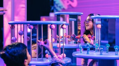 Children enjoying the Illuminate exhibition