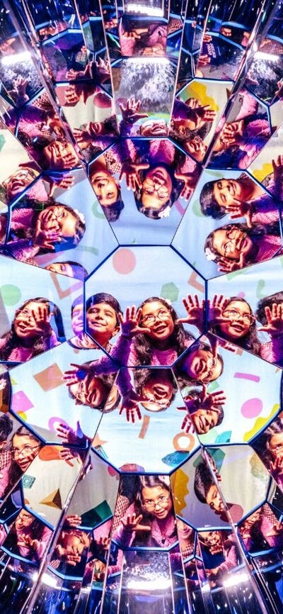 Child enjoying the Illuminate exhibition