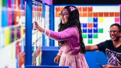Child enjoying the Illuminate exhibition