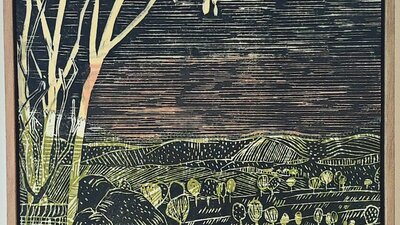 A print of a view into a tree filled valley,