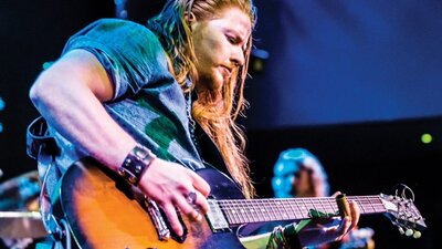 James Southwell playing guitar