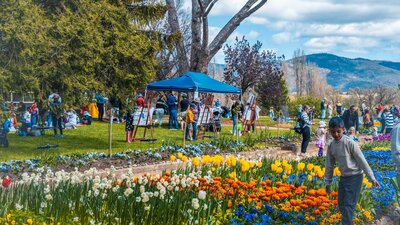 Kids Day Out Tulip beds and a group of children taking part in craft activities at Kids Day Out
